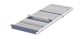 Palešu noturēšanas ierīces gravitācijas plauktos notur vai nodala paletes