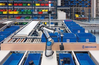 Komplektēšanas robots nodrošina maksimālu efektivitāti pasūtījumu komplektēšanā Komplektēšanas robots nodrošina maksimālu efektivitāti pasūtījumu komplektēšanā