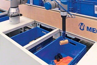 Komplektēšanas operācijas beigās pasūtījumu kaste tiek pārvietota uz citu iekārtas zonu